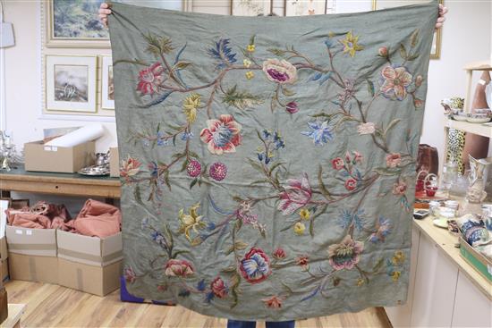 A crewel worked panel and another similar in green